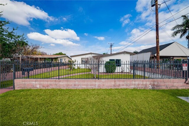 single story home featuring concrete driveway