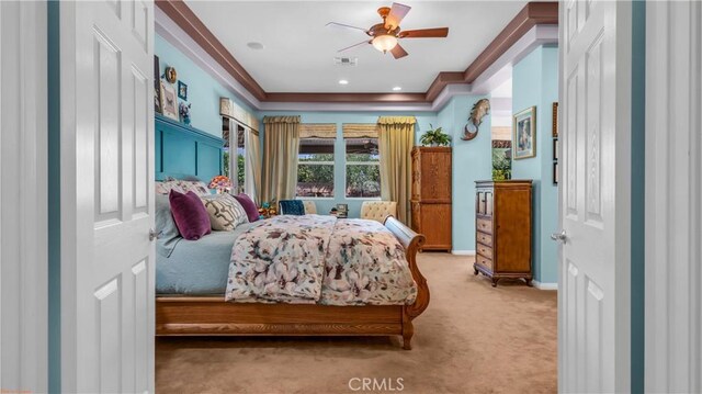 74078 W Petunia Pl, Palm Desert, CA 92211 - bedroom with light colored carpet, baseboards, crown molding, and a ceiling fan