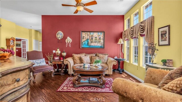 74078 W Petunia Pl, Palm Desert, CA 92211 - living room with a ceiling fan, wood finished floors, and baseboards