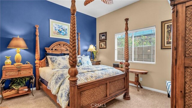 74078 W Petunia Pl, Palm Desert, CA 92211 - bedroom with carpet floors, baseboards, and a ceiling fan