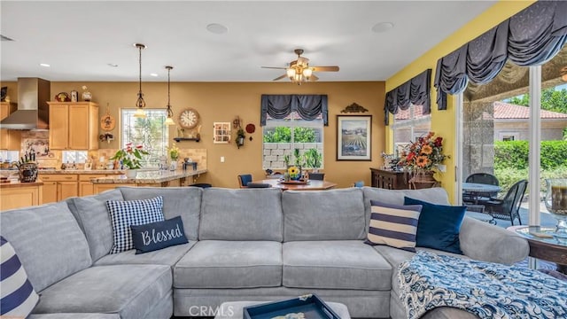 74078 W Petunia Pl, Palm Desert, CA 92211 - living room with plenty of natural light, a ceiling fan, and recessed lighting