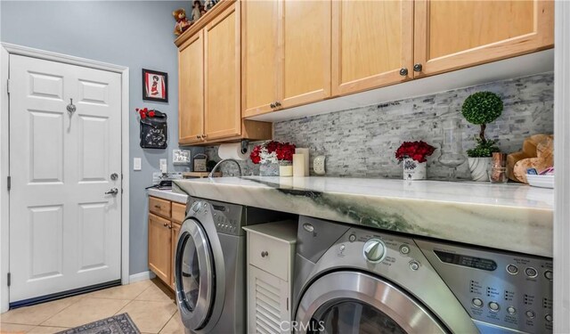 74078 W Petunia Pl, Palm Desert, CA 92211 - laundry area with independent washer and dryer, cabinet space, and light tile patterned flooring