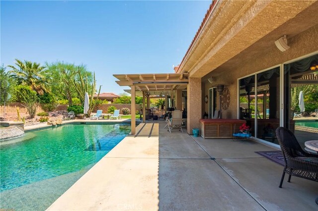 74078 W Petunia Pl, Palm Desert, CA 92211 - view of swimming pool featuring a patio area and a fenced backyard