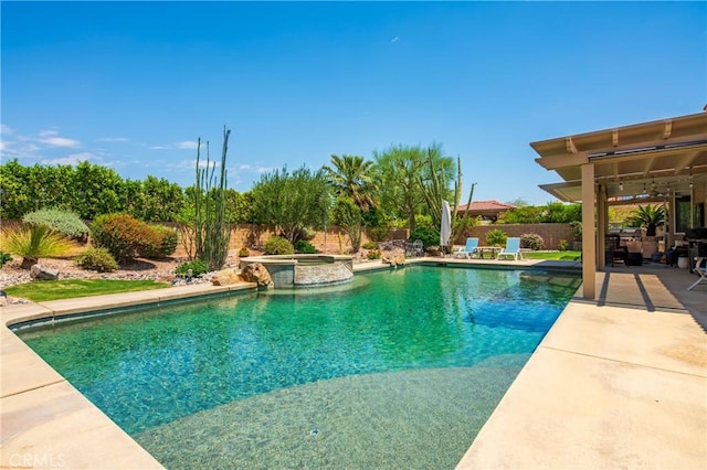 74078 W Petunia Pl, Palm Desert, CA 92211 - view of swimming pool with a patio area, a fenced backyard, and a pool with connected hot tub