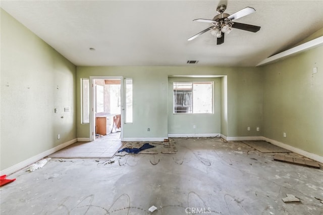 8975 Pumalo Rd, Lucerne Valley, CA 92356 - empty room featuring plenty of natural light, ceiling fan, and baseboards