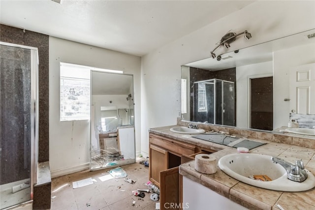 8975 Pumalo Rd, Lucerne Valley, CA 92356 - full bathroom with a shower stall and double vanity