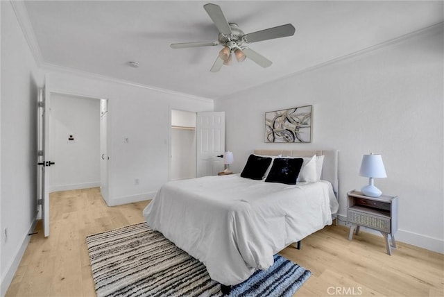 1010 W Macarthur Blvd Unit 8, Santa Ana, CA 92707 - bedroom with crown molding, light wood-type flooring, baseboards, and a ceiling fan