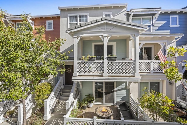 3644 Islander Walk, Oxnard, CA 93035 - view of front of house with a fire pit and stucco siding
