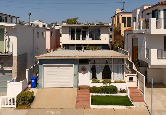 211 Crest Dr, Manhattan Beach, CA 90266 - view of front facade featuring concrete driveway, a garage, and a residential view