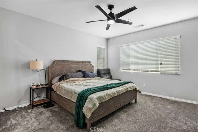 bedroom featuring carpet flooring, baseboards, and ceiling fan