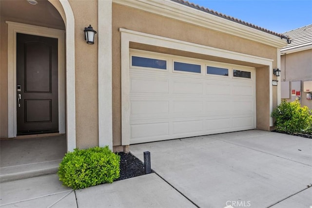 garage with driveway