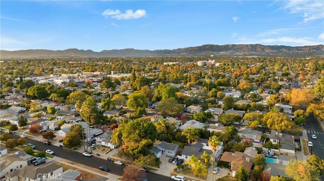 19119 Lemay St, Reseda, CA 91335 - aerial view of property and surrounding area with a mountainous background and nearby suburban area