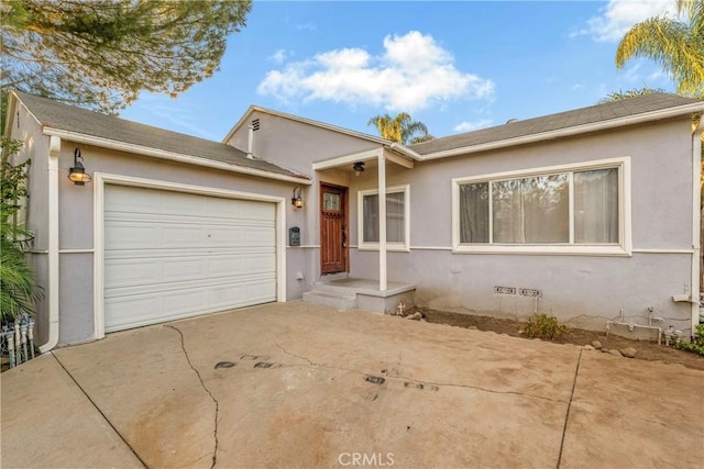 19119 Lemay St, Reseda, CA 91335 - ranch-style home with driveway, a garage, and stucco siding