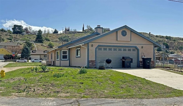 14402 Boxtree St, Lake Hughes, CA 93532 - single story home with an attached garage, concrete driveway, and a chimney