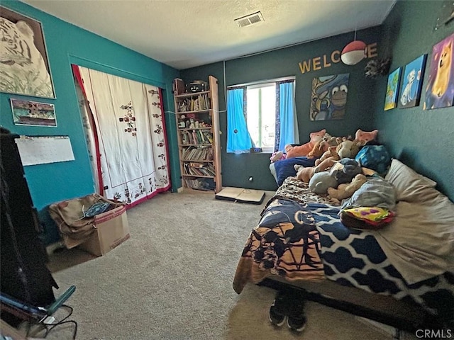 14402 Boxtree St, Lake Hughes, CA 93532 - bedroom with carpet flooring and a textured ceiling