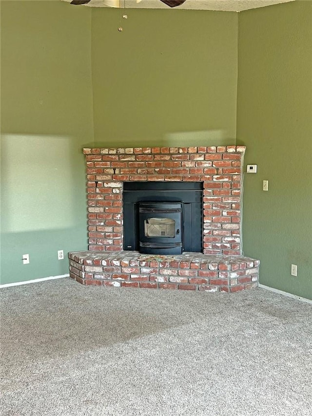 14402 Boxtree St, Lake Hughes, CA 93532 - detailed view of carpet, a ceiling fan, and a fireplace