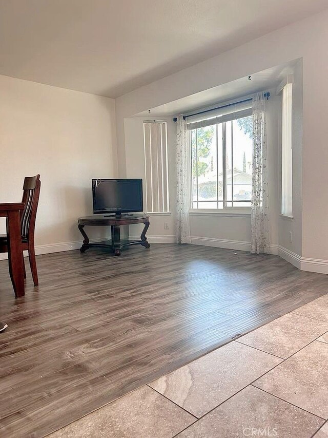 16045 Jackson Dr, Fontana, CA 92336 - living area with baseboards and wood finished floors