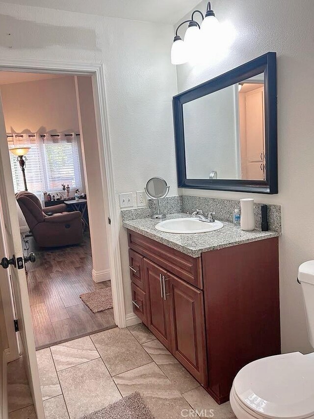 16045 Jackson Dr, Fontana, CA 92336 - bathroom with vanity and toilet