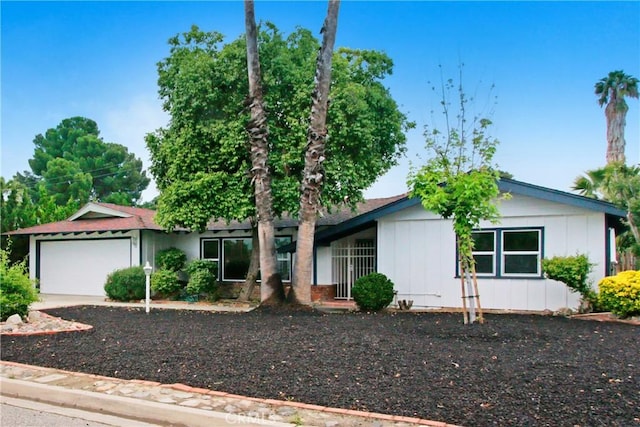 26110 Hemet St, Hemet, CA 92544 - ranch-style home featuring board and batten siding, a garage, and concrete driveway