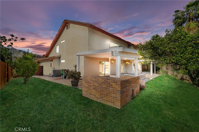 24071 Orange Creek Cir, Moreno Valley, CA 92557 - rear view of property featuring a patio, stucco siding, and central AC