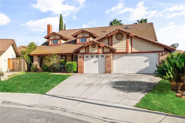 24071 Orange Creek Cir, Moreno Valley, CA 92557 - view of front of home with brick siding, an attached garage, a tile roof, concrete driveway, and a chimney