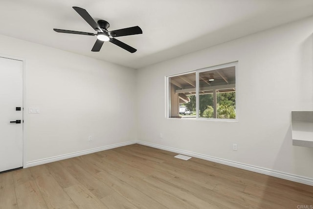 13500 Jamul Dr, Jamul, CA 91935 - empty room featuring light wood finished floors, baseboards, and a ceiling fan