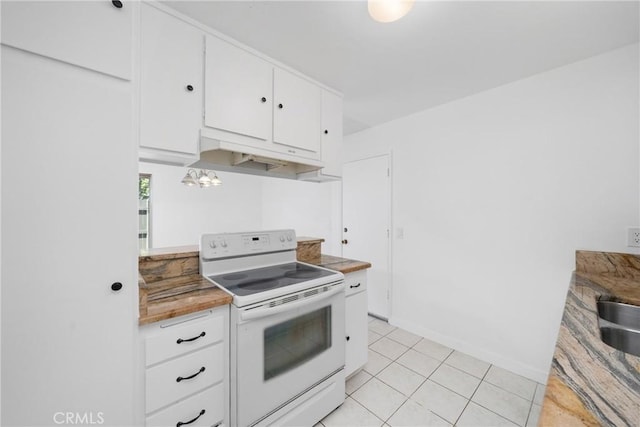 1622 Iowa St Unit A, Costa Mesa, CA 92626 - kitchen with white range with electric stovetop, under cabinet range hood, white cabinets, light tile patterned flooring, and baseboards