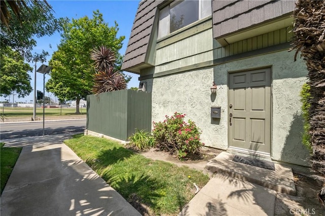 1622 Iowa St Unit A, Costa Mesa, CA 92626 - entrance to property with stucco siding and mansard roof