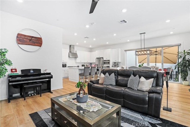 27120 Purple Sage Ct, Valencia, CA 91381 - living room featuring light wood-style floors, recessed lighting, and ceiling fan
