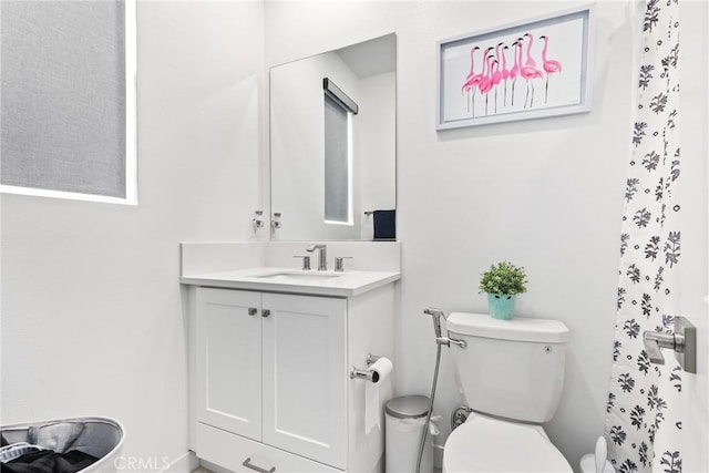 27120 Purple Sage Ct, Valencia, CA 91381 - full bath with toilet, vanity, and a shower with curtain