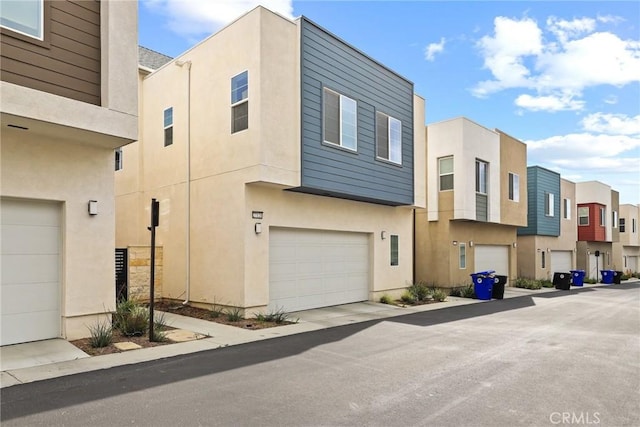 27120 Purple Sage Ct, Valencia, CA 91381 - view of property featuring a garage and a residential view