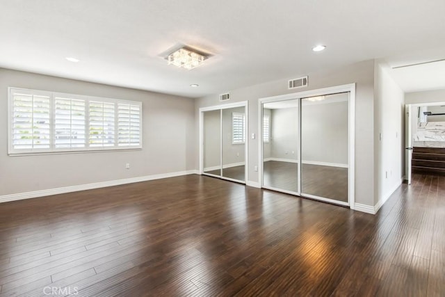 2819 Steeplechase Ln, Diamond Bar, CA 91765 - unfurnished bedroom featuring dark wood-style floors, baseboards, two closets, and recessed lighting