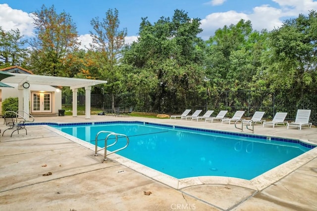 2819 Steeplechase Ln, Diamond Bar, CA 91765 - community pool featuring french doors, fence, a patio, view of wooded area, and an exterior structure