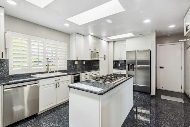 2819 Steeplechase Ln, Diamond Bar, CA 91765 - kitchen featuring stainless steel appliances, granite tiled floors, a skylight, beverage cooler, and recessed lighting