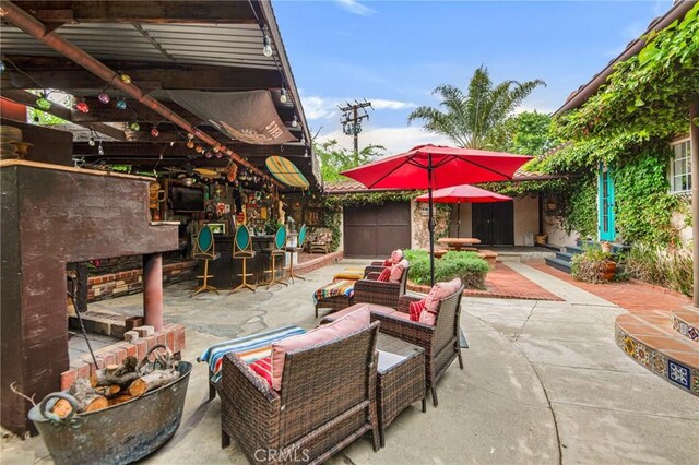 22658 Arriba Dr, Saugus, CA 91350 - view of patio with an outdoor hangout area