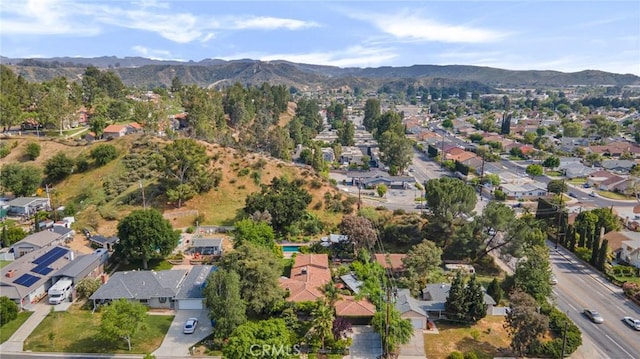 22658 Arriba Dr, Saugus, CA 91350 - aerial view of property's location with a mountainous background and nearby suburban area