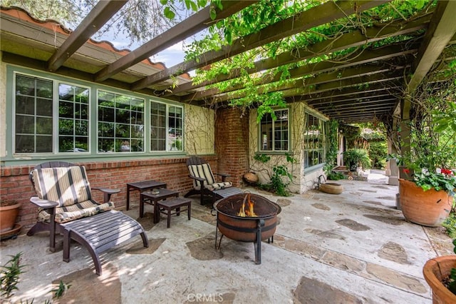 22658 Arriba Dr, Saugus, CA 91350 - view of patio / terrace with a fire pit and a pergola