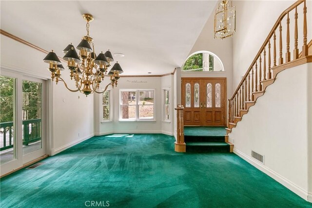 109 S Fairway Dr, Lake Arrowhead, CA 92352 - carpeted foyer featuring a chandelier, healthy amount of natural light, baseboards, and crown molding