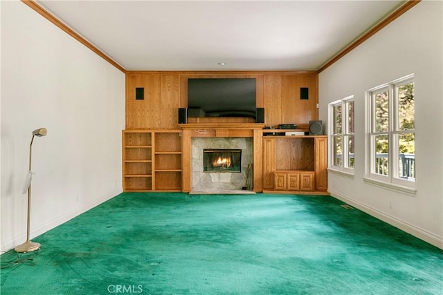 109 S Fairway Dr, Lake Arrowhead, CA 92352 - unfurnished living room with crown molding, a tile fireplace, carpet floors, baseboards, and healthy amount of natural light