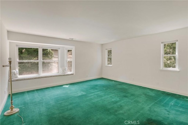 109 S Fairway Dr, Lake Arrowhead, CA 92352 - carpeted empty room with baseboards and plenty of natural light
