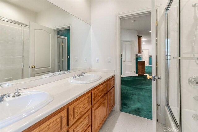 109 S Fairway Dr, Lake Arrowhead, CA 92352 - bathroom with double vanity, tile patterned flooring, and bath / shower combo with glass door