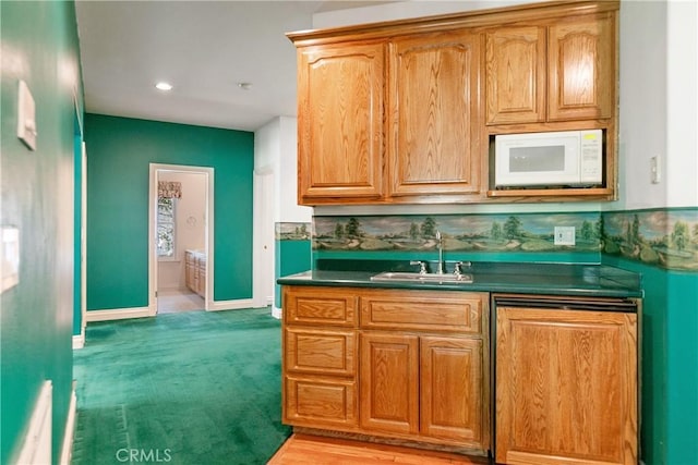 109 S Fairway Dr, Lake Arrowhead, CA 92352 - kitchen featuring a sink, white microwave, dark countertops, and baseboards