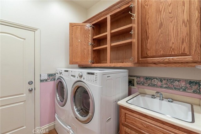 109 S Fairway Dr, Lake Arrowhead, CA 92352 - clothes washing area with washing machine and clothes dryer and cabinet space