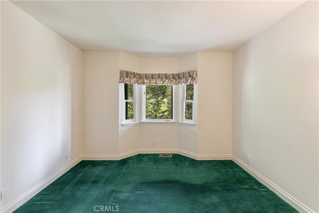 109 S Fairway Dr, Lake Arrowhead, CA 92352 - carpeted empty room featuring baseboards