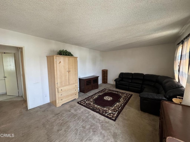 8800 Cedros Ave Unit 210, Panorama City, CA 91402 - carpeted living area featuring a textured ceiling