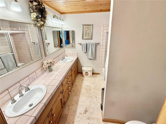 1900 Teton Way, Pine Mountain Club, CA 93222 - full bath featuring toilet, double vanity, a stall shower, wooden ceiling, and baseboards