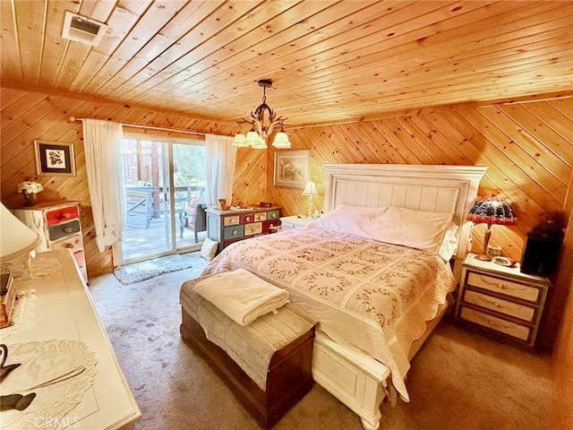 1900 Teton Way, Pine Mountain Club, CA 93222 - carpeted bedroom featuring access to exterior, wooden walls, wooden ceiling, and a chandelier