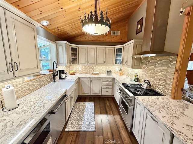 1900 Teton Way, Pine Mountain Club, CA 93222 - kitchen featuring wall chimney range hood, stainless steel appliances, wood ceiling, light stone countertops, and lofted ceiling