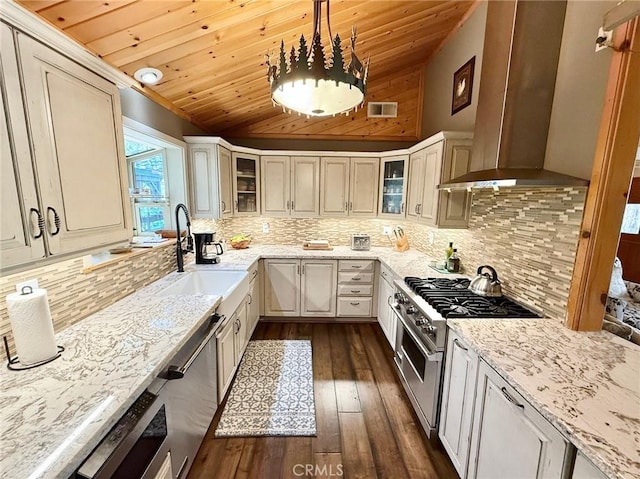1900 Teton Way, Pine Mountain Club, CA 93222 - kitchen featuring wall chimney range hood, stainless steel appliances, wood ceiling, light stone countertops, and lofted ceiling