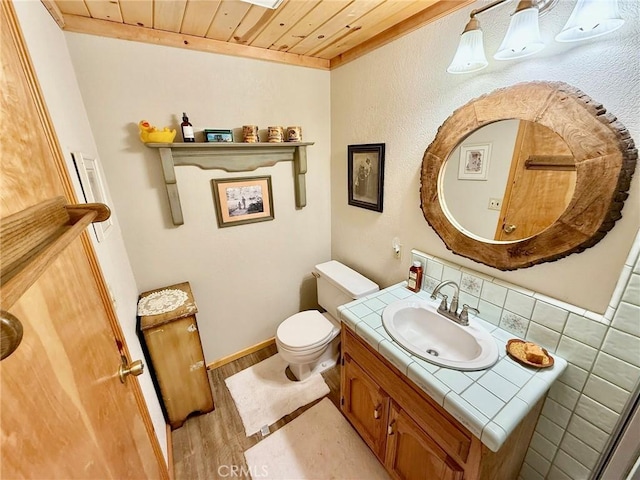 1900 Teton Way, Pine Mountain Club, CA 93222 - bathroom featuring wooden ceiling, vanity, and wood finished floors